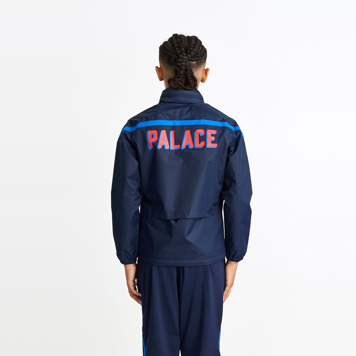 26/27 Training Shower Jacket Junior Navy